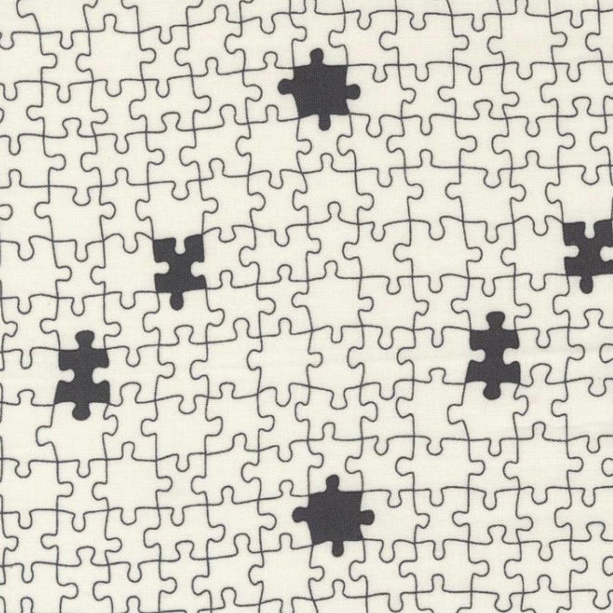 ABC XYZ Cream Black Puzzle Pieces Fabric