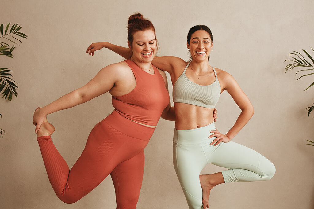 two girls wearing gym clothes