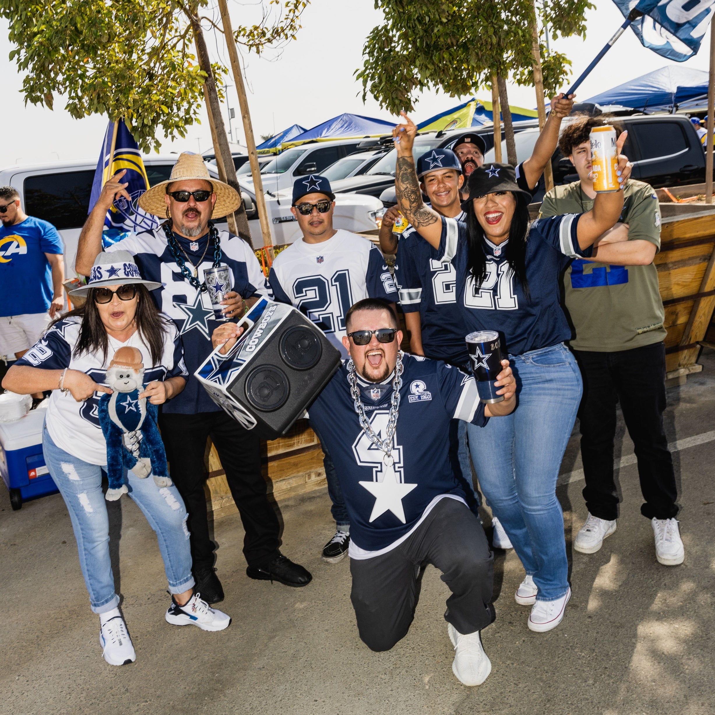 Fans posing with Dallas Cowboys KoolTunes®
