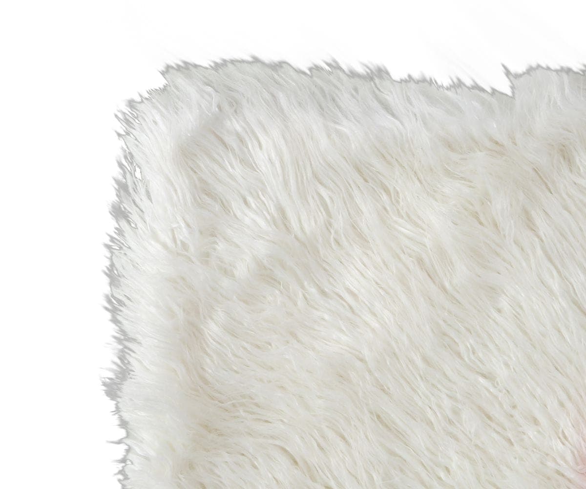 Boras Mongolian Faux Fur Throw White Dania Furniture