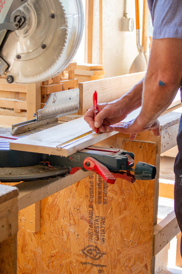 Man measuring wood