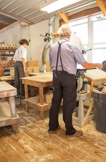 Father and son in woodshop