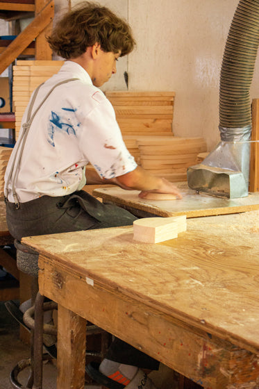 Boy working in woodshop