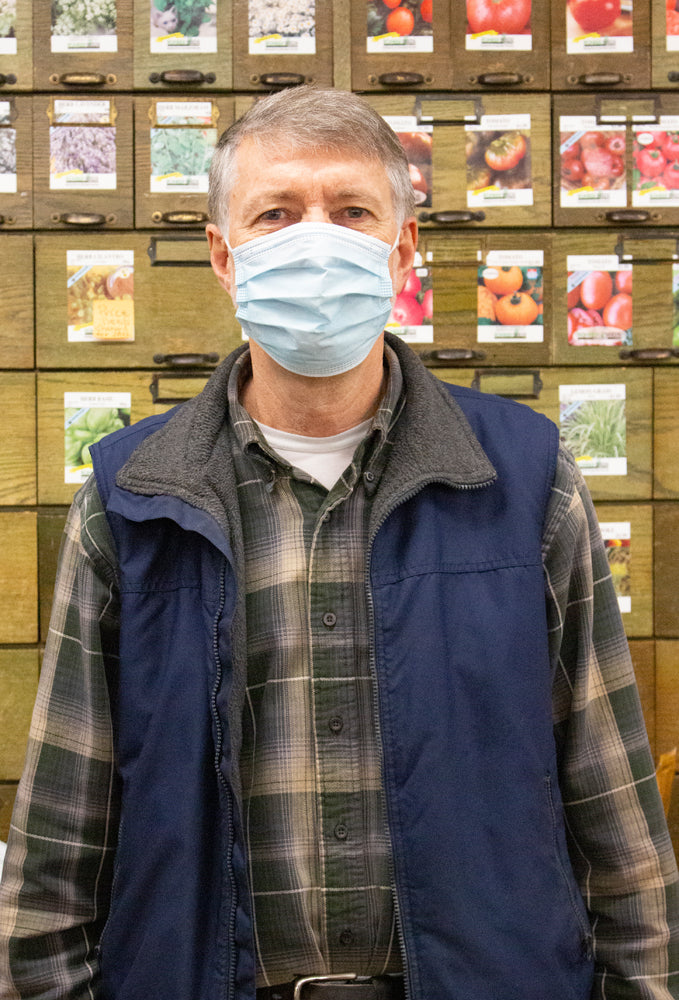 Man in seed room