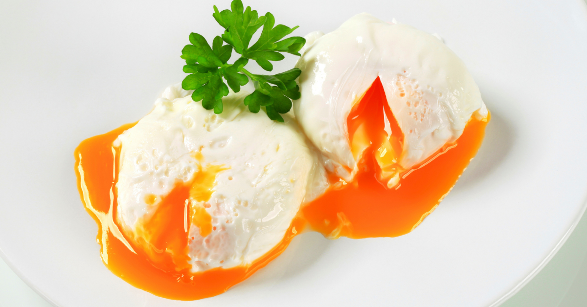 Two poached eggs with parsley.