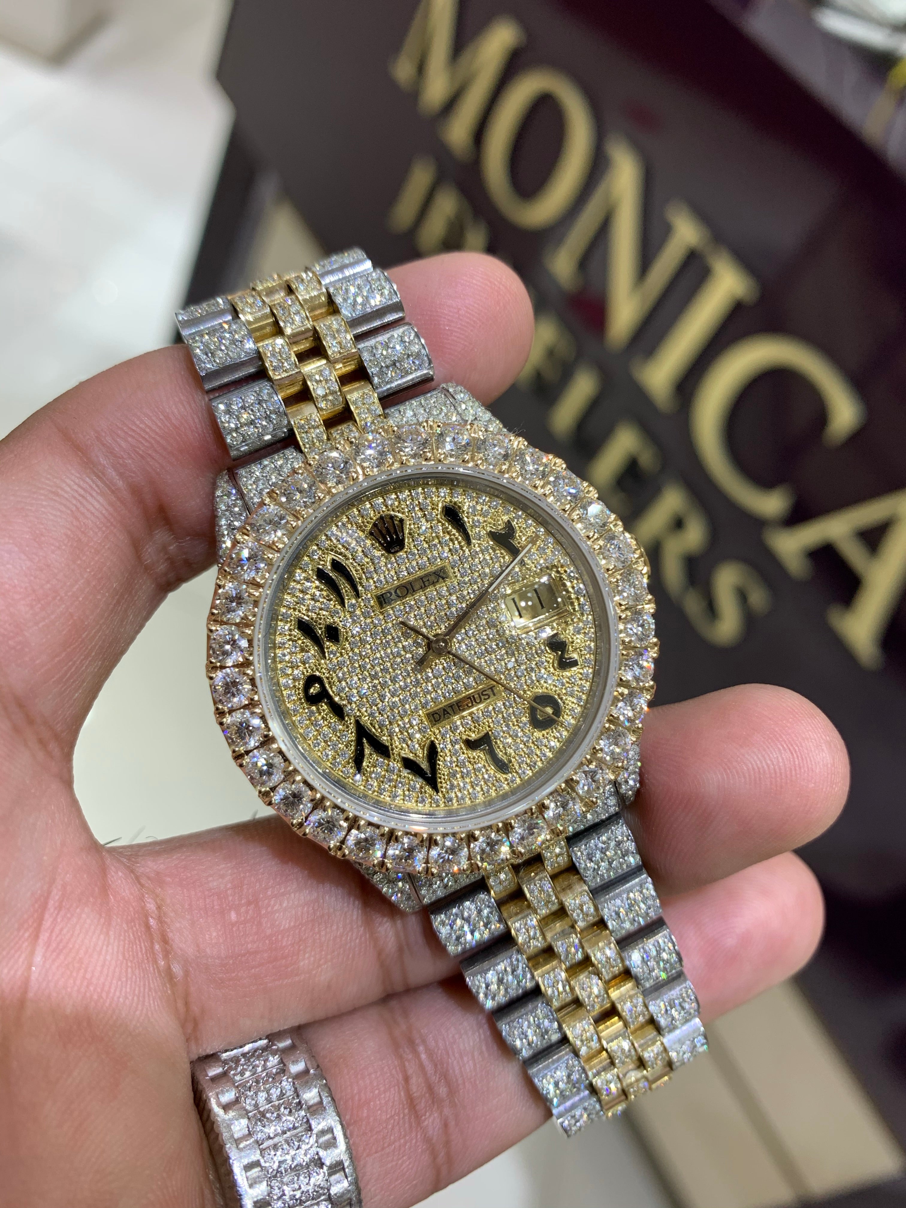 iced out rolex with arabic numerals