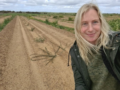 Christie in front of the Trees Planted