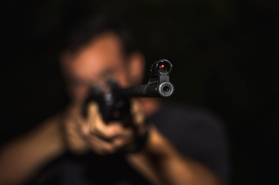 Man aiming his gun 