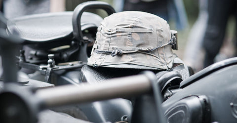Close up of a combat helmet set on a vehicle