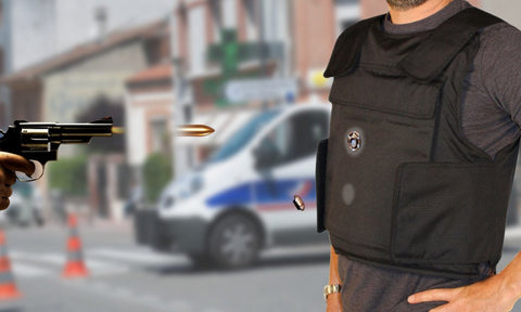 Gun being fired at a man wearing a black bulletproof vest