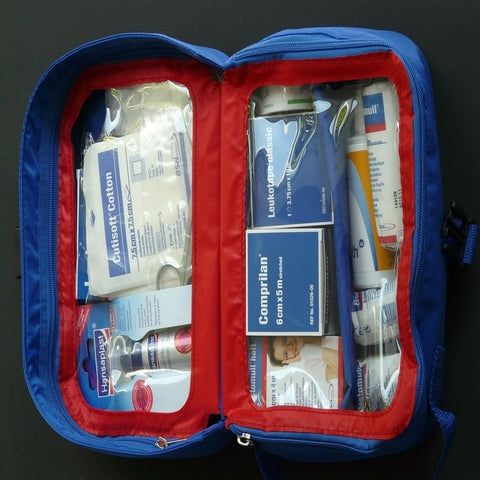 An open first aid kit