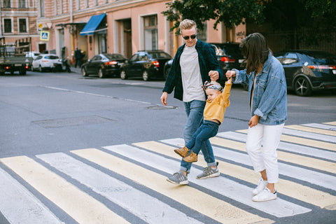 image of family walking on the street