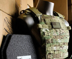 Plate carrier in a mannequin and two hard armor plates