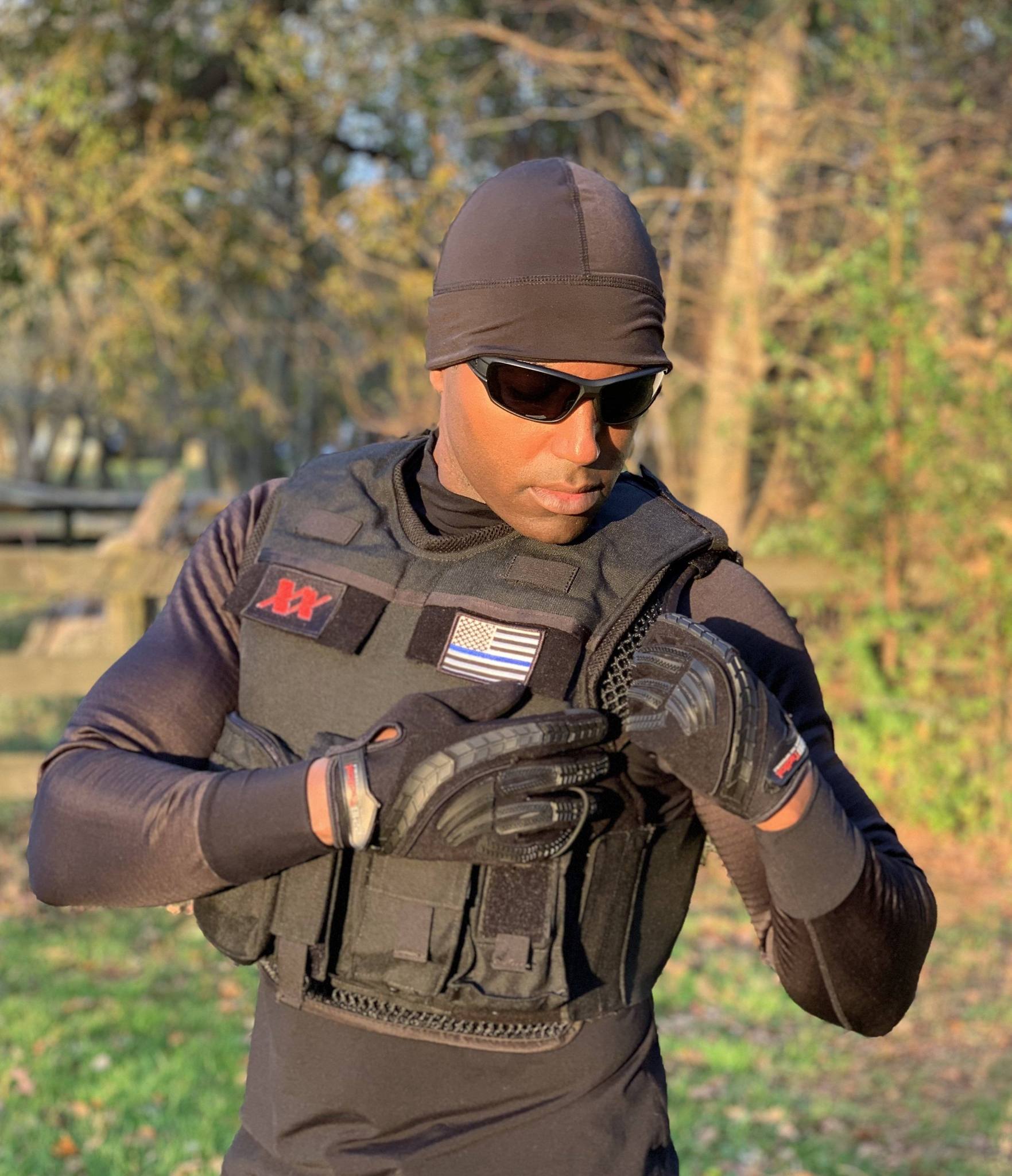 Man wearing tactical gear and EQUINOXX WATCH CAP BEANIE