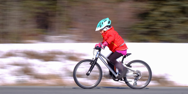 child on bicycle