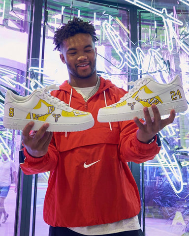 Kyler Murray with kobe bryant shoes and cool hair. 