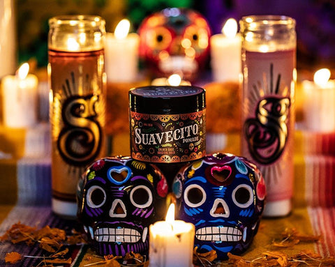 Suavecito Fall edition pomade with candles and a day of the dead theme. 