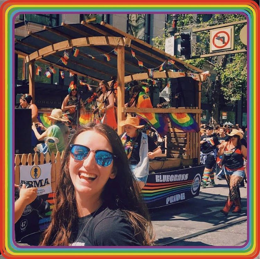 Image of Kara Kundert, Bluegrass Pride's Executive Director, at the 2018 SF Pride Parade.