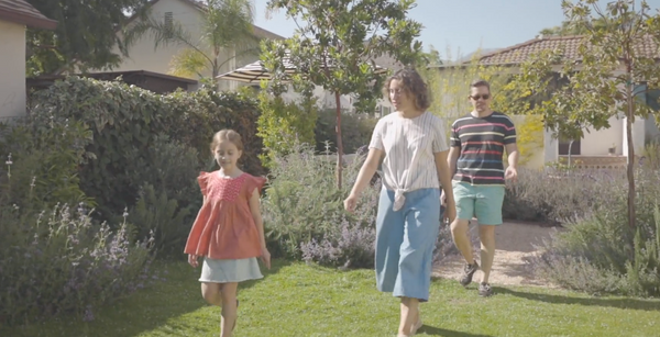 Family walking on a california-friendly lawn alternative