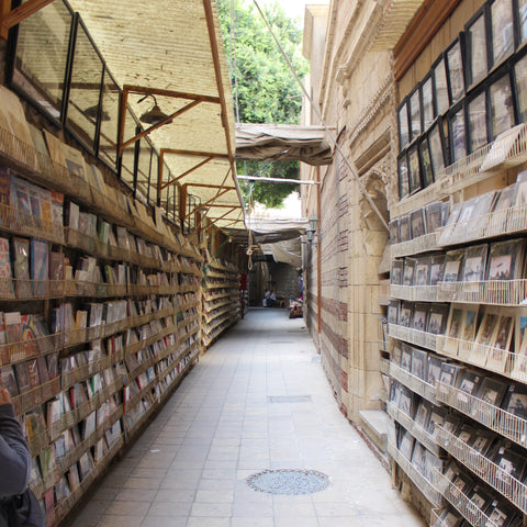 Booksellers Line the Narrow Alleys of Coptic Egypt (LEO Design)
