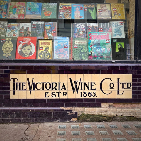 Victorian Wine Shop Signage on a Contemporary Comic Book Shop in Notting Hill, London (LEO Design)
