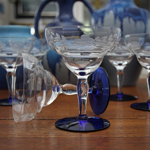 Set of Six Softly-Faceted, Corseted and Hand-Etched Champagne Coupes with Cobalt Feet (LEO Design)