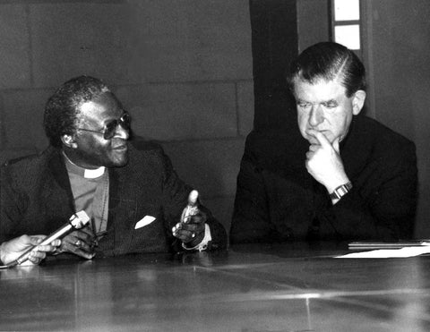 Austin with Archbishop Desmond Tutu, of Capetown, and marks his involvement in the anti-apartheid movement