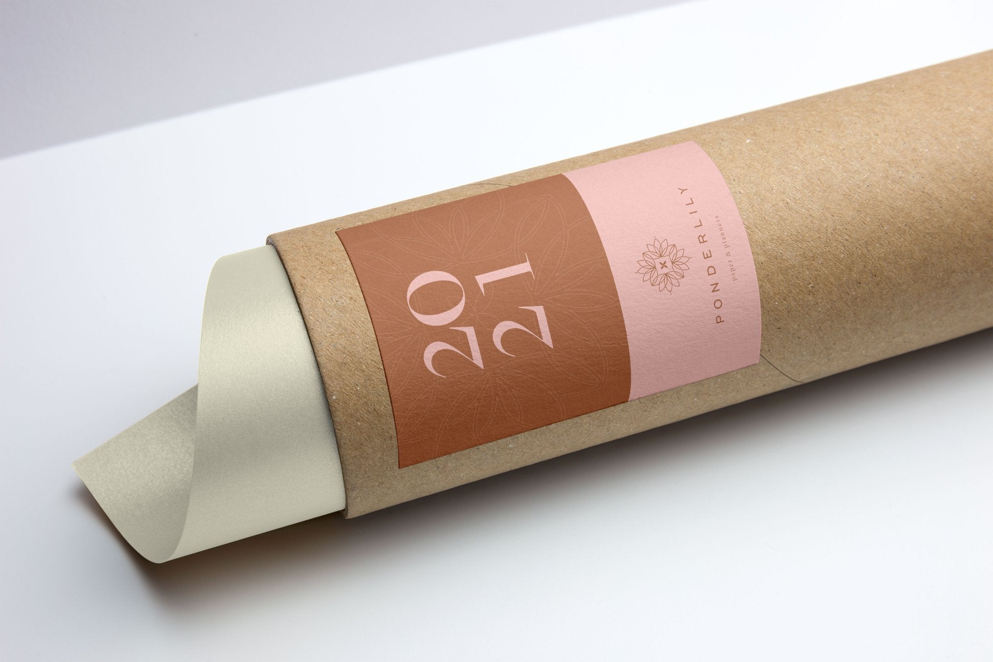 The Ponderlily 2021 Wall Planner in it's sustainable cardboard packaging tube