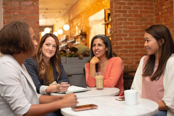 woman sitting around in a meeting