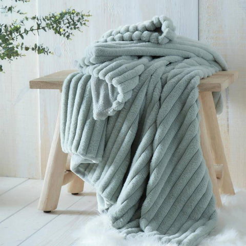 Unveiling Elegance and Comfort with Our Throws