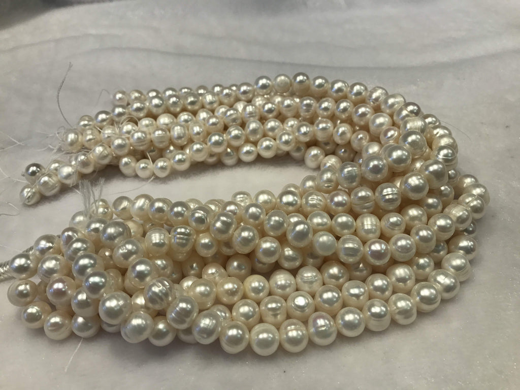 Strands Of Loose Pearls 11mm Off-Round White – Pearl Rack