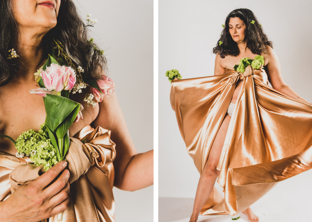 Two Models Draped in Beige Cloth