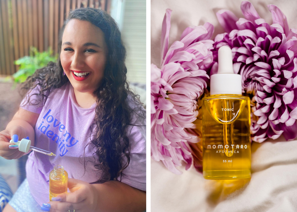 Alysse Dalessandro Santiago Holding Tonic and Tonic and a Purpke Flower