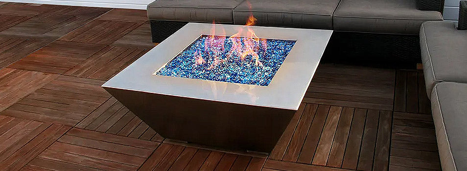 Edge fire pit on a wooden porch with 2 large patio couches