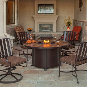 OW Lee fire pit with four club chairs
