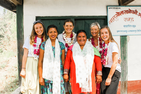 Chrissy and her three daughters on the Flo Gives Back trip to Nepal