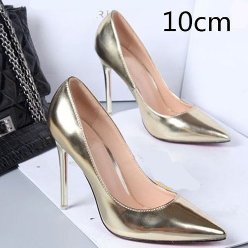 gold pointed high heels