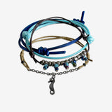 Stackable Seahorse Bracelet 4 piece set. Blue wave cord bracelets are adjustable. Displayed with a gunmetal seahorse charm and blue ocean beads. Stack bracelets are handmade. Created by O Yeah Gifts!