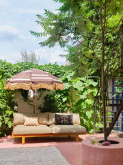 patio with parasol and outdoor sofa