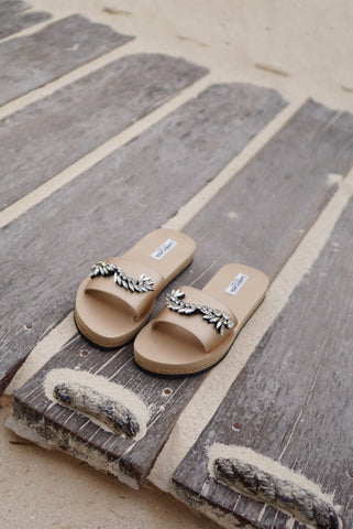 sandals by the beach