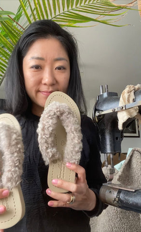 designer is making teddy fur flip flops shoes at NYC studio