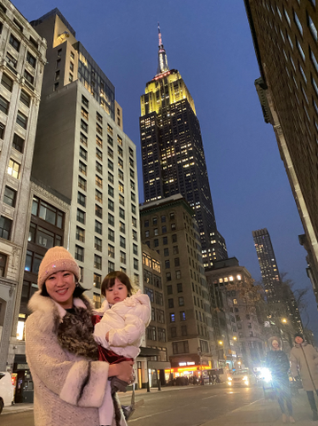 Mom and daughter in New York City Empire state 