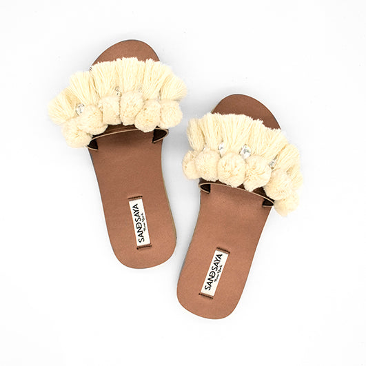 white pom pom sandals