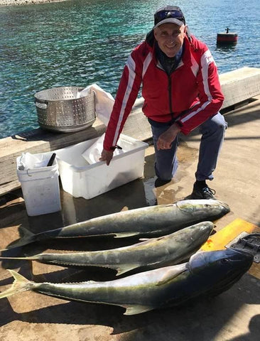 Bruce back at the ramp with 3 big Kingfish on Greenwood Charters