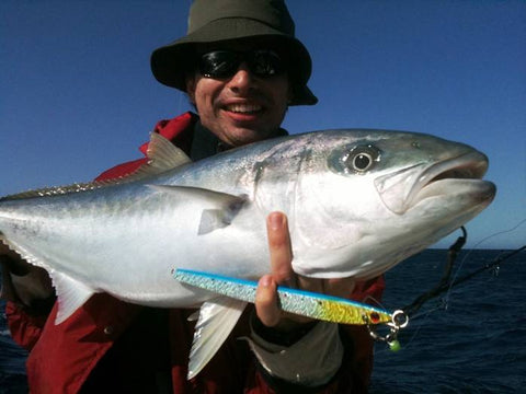 Andrew getting Kingfish at Coffs Harbour on jigs