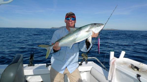 Hooking Kingfish on a pink 250 gram jig in a heavy current