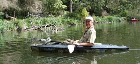 Andy with a rod holder attached to his Kayak