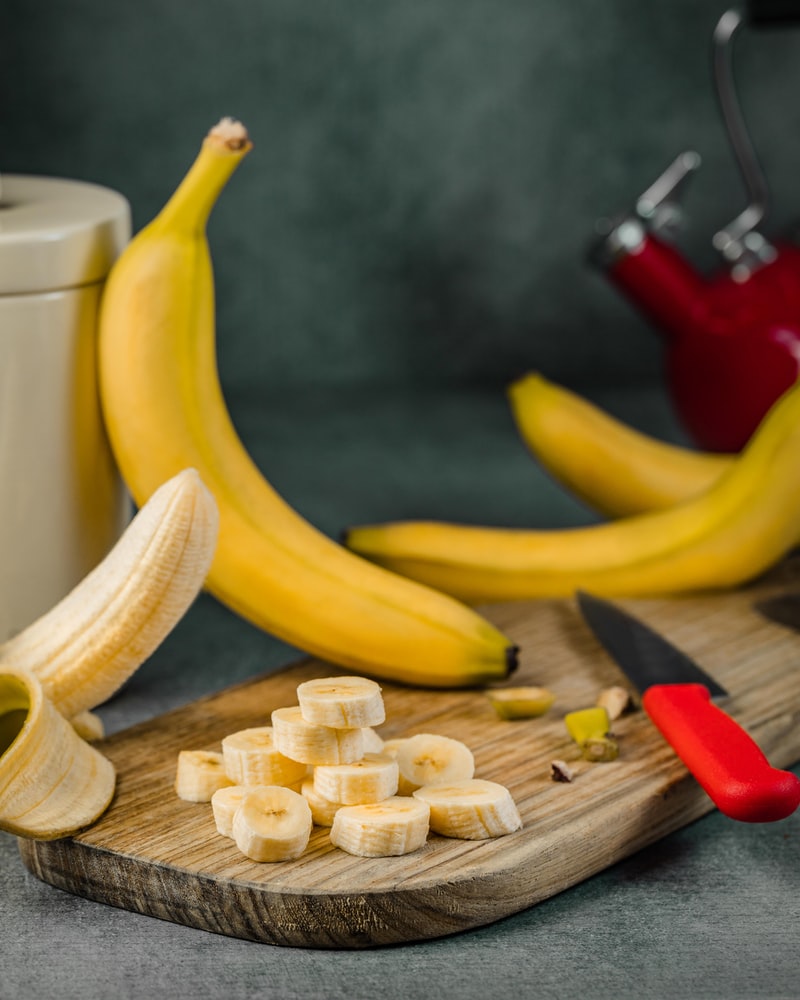 sliced banana on cutting board