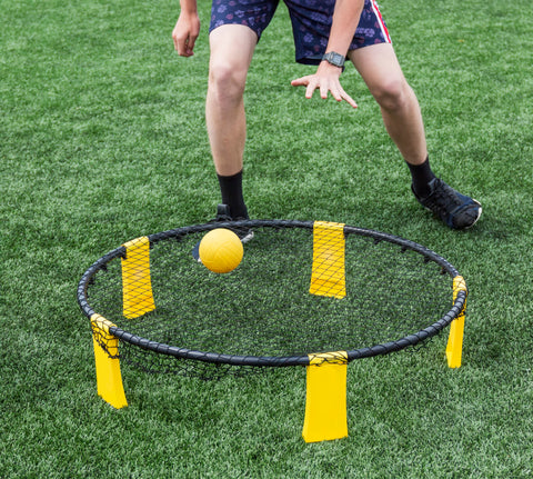 Boy playing Spike Ball