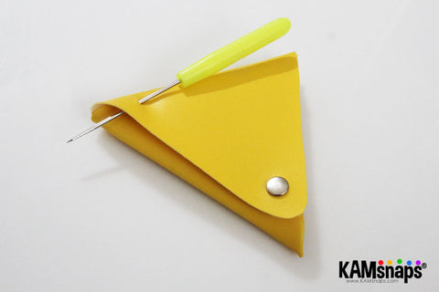purse with plastic triangles
